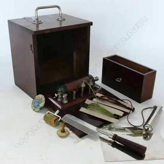 ELECTROTHERAPY DEVICE IN MAHOG BOX